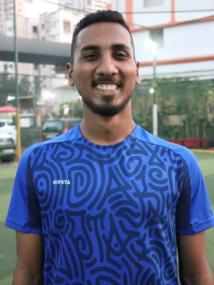 A portrait of Coach Rohan, another key member of our coaching staff, dedicated to player development.
