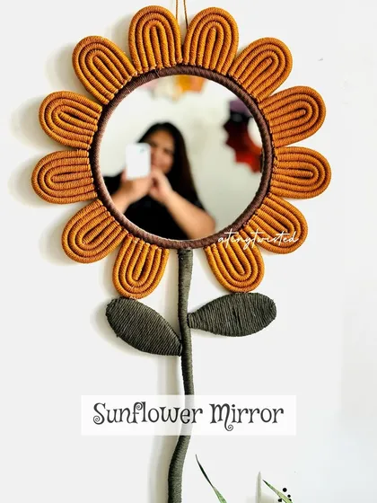 Bring a little sunshine indoors with my handmade sunflower mirror. This piece is designed to make you smile every time you look at it. It's perfect for a child's room, a dressing table, or anywhere you need a pop of joy.