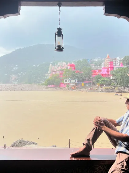 Taking a moment to gaze at the river from a quiet window in Rishikesh. These pauses are just as important as the practice itself, allowing for integration and reflection.
