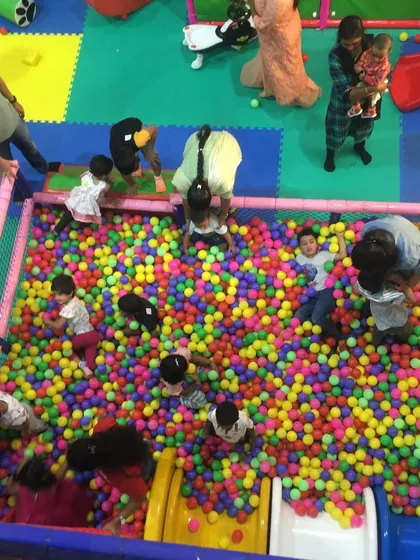 An aerial view of our bustling ball pit shows just how much fun a group of kids can have together. It's a sea of color and a hub of laughter and play.