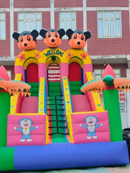 Another angle of the Mickey and Doraemon 3-lane slide, showing the sturdy construction and vibrant colors.