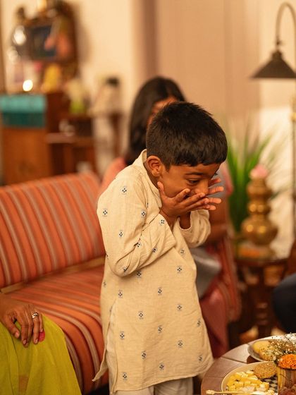 Caught in the act. The face of pure delight after sneaking a taste of our delicious Diwali sweets.