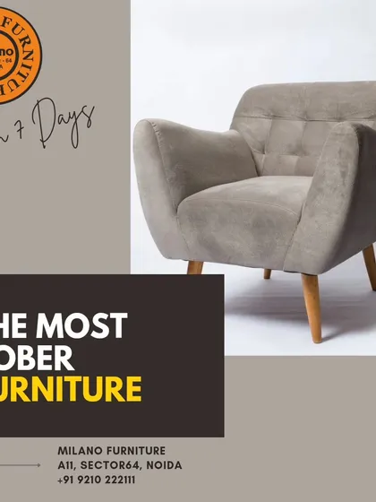 This sober and elegant armchair features a simple design with a tufted back and tapered wooden legs. It's a versatile piece that fits well in both modern and classic interiors.
