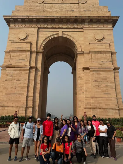 A group photo celebrating a couple's 16th anniversary at India Gate. We are honored to be a part of our guests' special moments and milestones.