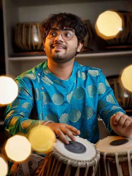 Another take from the same photoshoot, with a warm and happy feel. The bokeh lights add a touch of magic.