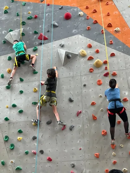 The weekend is for climbing with your crew. Here you can see multiple climbers enjoying the auto-belay and top-rope sections.