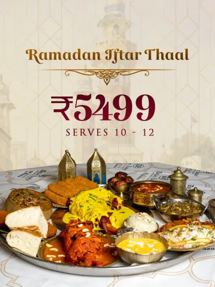 Our grand Ramadan Iftar Thaal, priced at ₹5499 and serving 10-12 people. It's a symphony of flavors, perfect for large family gatherings and Iftar parties.