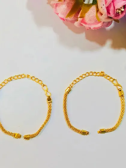 Here is another look at our popular gold-plated Rakhi chains. The simple, flat design is comfortable to wear and easy to decorate.