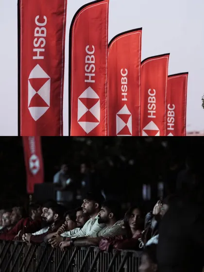 We ensure our partners are seen. High-visibility branding, like these HSBC flags lining the venue, is a fundamental part of our strategy to guarantee your brand achieves maximum impact and recall among a massive, engaged audience.