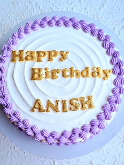 A top-down view of the classic royal icing birthday cake.