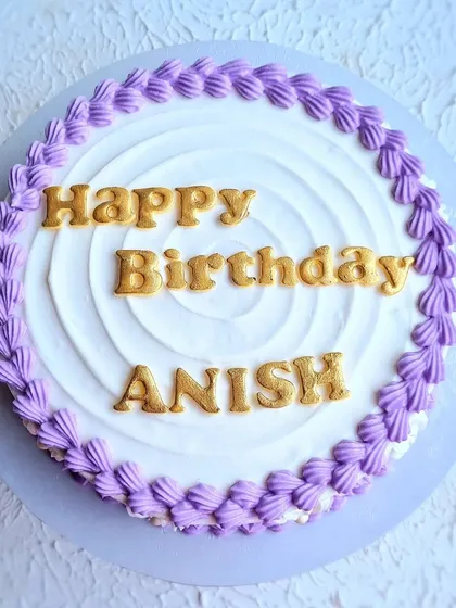 A top-down view of the classic royal icing birthday cake.