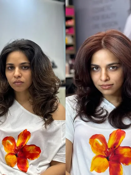 For those who want something bold but sophisticated, this reddish chocolate brown is perfect. This before and after shows how I corrected her previous color and gave her a vibrant, dimensional new look with a fresh cut.