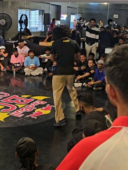 A duplicate photo of the Red Bull BC One cypher in action.