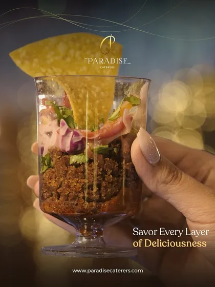 Savor every layer of deliciousness. This deconstructed chaat in a glass combines multiple textures and flavors, from crunchy to creamy, for a delightful experience.