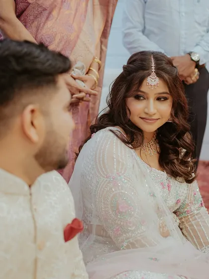 A sweet look exchanged between the couple during their engagement.
