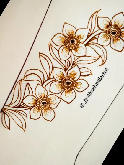 A simple and elegant floral vine, perfect for learning the basics of drawing flowers and leaves with a natural flow.