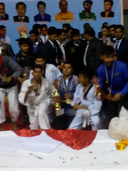 The joyous chaos of victory. Our team celebrating their wins with trophies and medals.