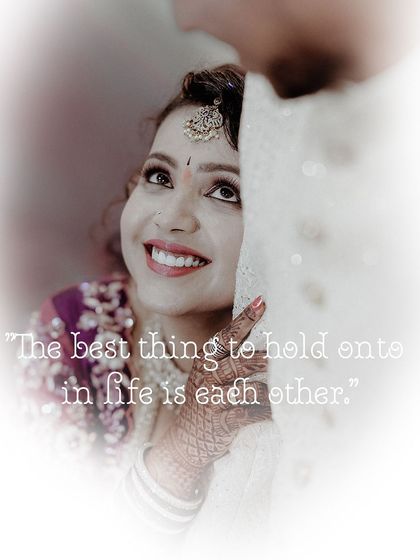 A beautiful shot of the bride looking up at her groom with adoration. The soft focus and romantic quote make this a truly special engagement memory.