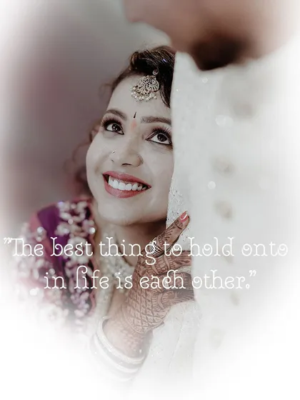 A beautiful shot of the bride looking up at her groom with adoration. The soft focus and romantic quote make this a truly special engagement memory.