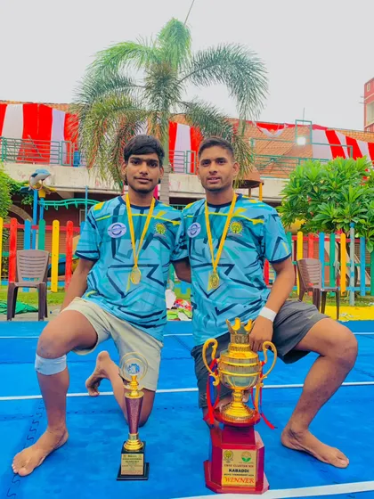 Two of my senior players with their trophies after a successful CBSE cluster tournament.