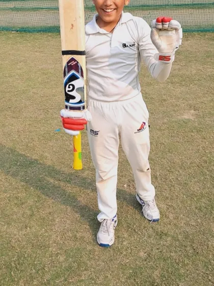 A young player from the SKCA team celebrating after a great performance. Our coach, Sonu Sir, is building a special team for the future.