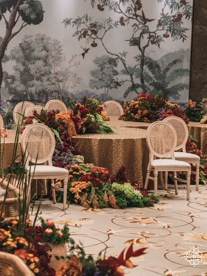 A wide view of the 'Orchard of Life' dining area, with tables set amidst the indoor forest.