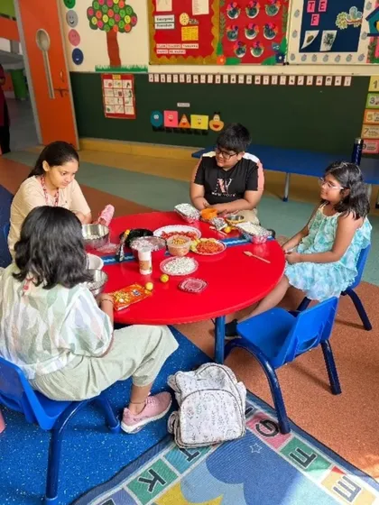 Engaged in a culinary arts workshop, students learn to mix ingredients for a tasty snack. Our summer camp activities are designed to be both educational and enjoyable, teaching practical life skills.