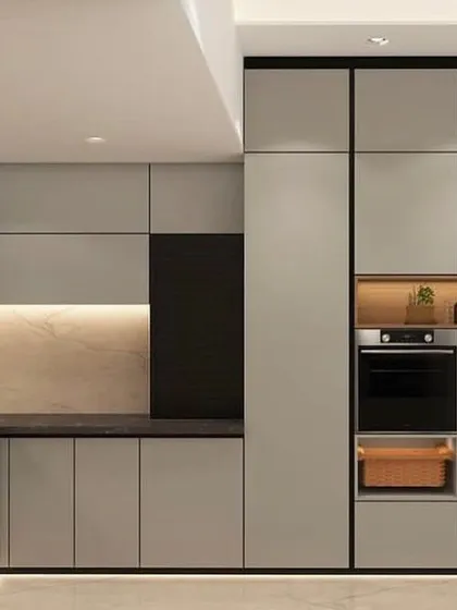 This 3D render showcases a minimalist kitchen design focused on clean lines and functionality. The layout features a full wall of tall units with seamlessly integrated double ovens, demonstrating how we can create a custom fit for all your appliances.