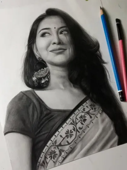 The finished portrait for a client from Delhi NCR. The traditional saree and large jhumka earrings create a stunning and classic look.