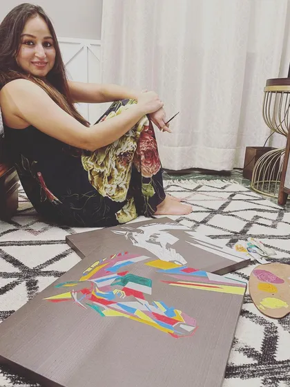 This is me in my natural element, on the floor surrounded by paint and canvases. I am truly obsessed with art, and I bring that passion into every workshop. These colorful horse paintings were the subject of one of my recent Paint & Sip events.