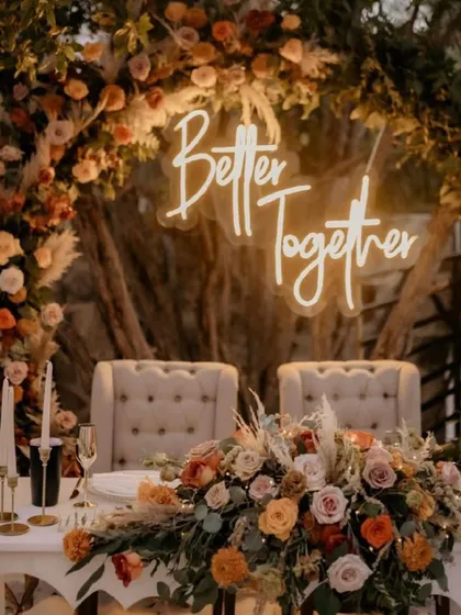 A custom "Better Together" neon sign is the perfect addition to a wedding or engagement party. It creates a beautiful focal point for the couple's table and a great photo opportunity.