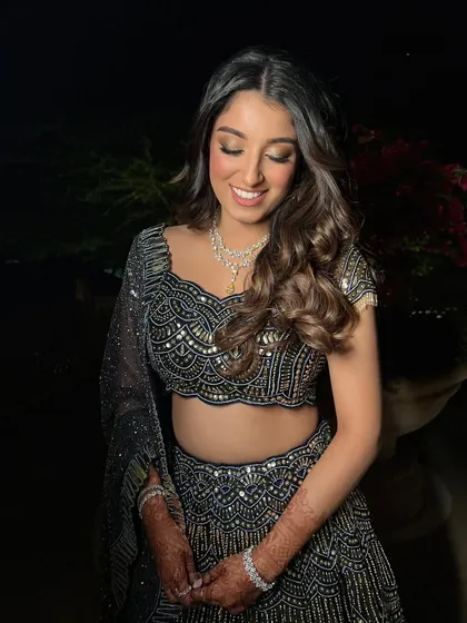 Another shot of the bridesmaid, her wavy hair catching the light perfectly.
