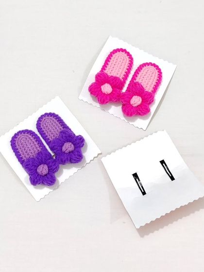 Puff flower hairpin sets in bright pink, purple, and orange combinations.