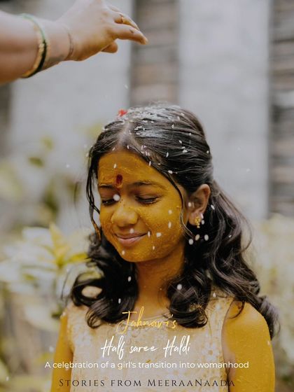 A duplicate of ID 128, this beautiful portrait captures a moment of serene transition during a Half Saree Haldi ceremony.