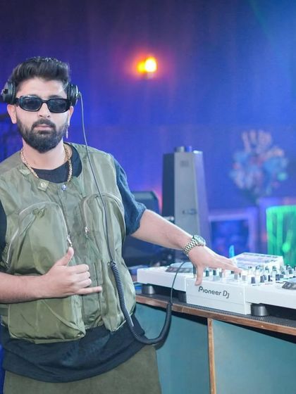 Ready for my gig at Hydra Club Kitchen, rocking a utility vest.