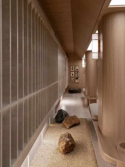 For a wellness brand, the architecture must breathe tranquility. I used a restrained palette of natural stone and warm wood, creating corridors that are not just passages but meditative pauses. The interplay of light, texture, and proportion guides a journey of calm.
