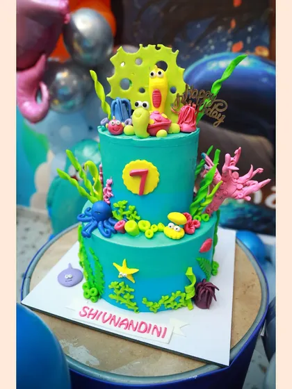 A stunning two-tiered "Under the Sea" themed cake for Shivanandini's 7th birthday.