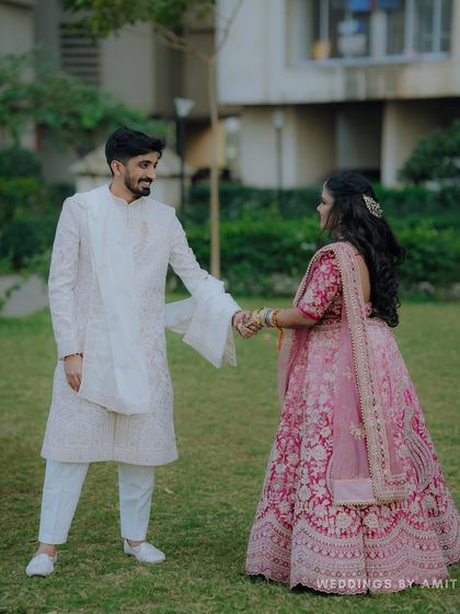 A playful moment between the couple during their outdoor shoot. We encourage our clients to be themselves, which results in natural and joyful photos.