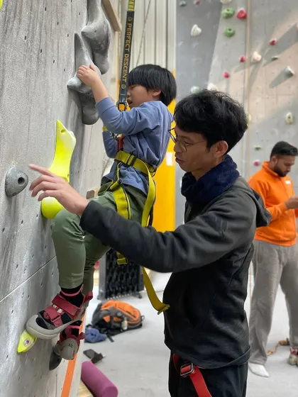 A little guidance goes a long way. Our instructors are always on the floor, offering tips on footwork and hand placement to help first-timers feel confident on the wall.