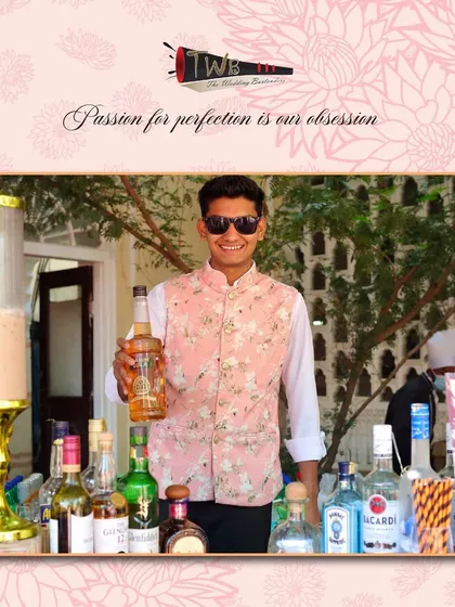 A bartender at a sunny Haldi brunch, ready to serve up refreshing cocktails to guests.