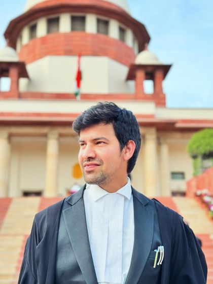 A confident pose outside the Supreme Court. Believing in yourself and never quitting is the formula for becoming a winner in any field.