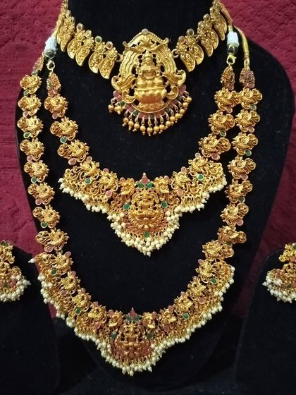 A complete South Indian temple jewellery set with a choker and two layered harams.