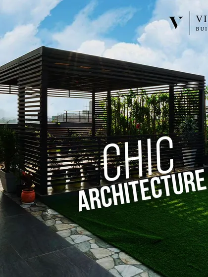 We extend luxury to every part of the home, including this chic rooftop terrace. This space, featuring a modern pergola and lush green turf, is designed for relaxation and entertainment, offering a private escape with a view.