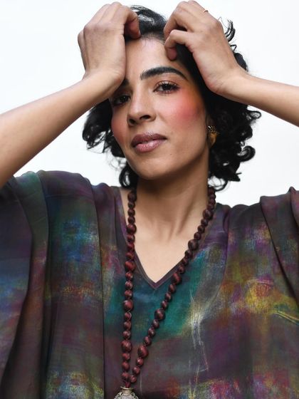 Another raw and beautiful shot for House of Wandering Silk. The model's expressive pose and the rich colors of the garment need no retouching.