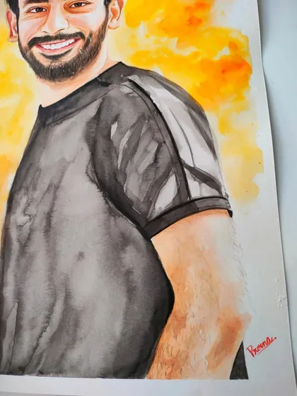 A close-up of a custom watercolor portrait. I love how watercolors allow for both soft washes and sharp details, as seen in the shirt and beard.
