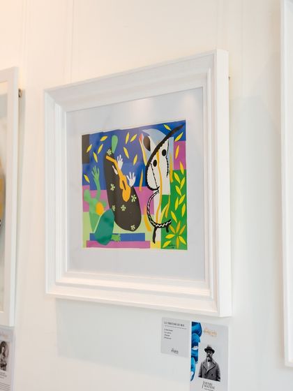 The Henri Matisse lithograph, 'La Tristesse du Roi,' hanging in our gallery. We are proud to feature works from such an influential artist, known for his original and fluid use of color.