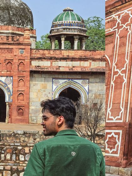A view of the smaller tombs on the grounds of Humayun's Tomb, with their beautiful blue and green tiled domes.