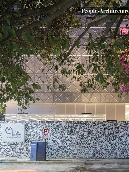 The street-level boundary wall of MAP, featuring a public art installation. This makes the museum's engagement with art begin at the sidewalk.