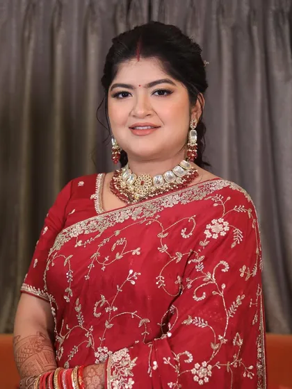 The mega-watt cheek glow on this bride is everything. For her reception, I created a radiant look with a beautiful red saree that makes her look absolutely lovely.
