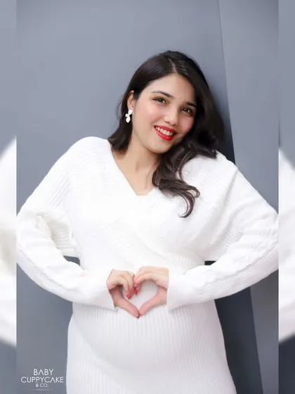 A simple, timeless portrait from one of our studio sessions. We love this classic pose, a heart for the little heart beating inside. It’s all about celebrating your beautiful bump in a clean, simple setting.